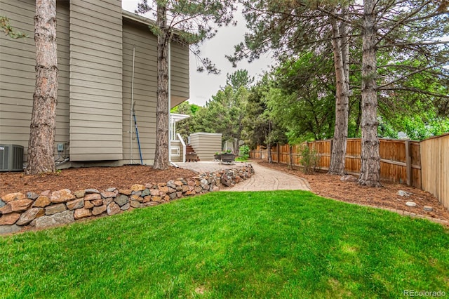 8588 S Woody Way, Highlands Ranch, CO 80126 - fenced backyard featuring a patio area
