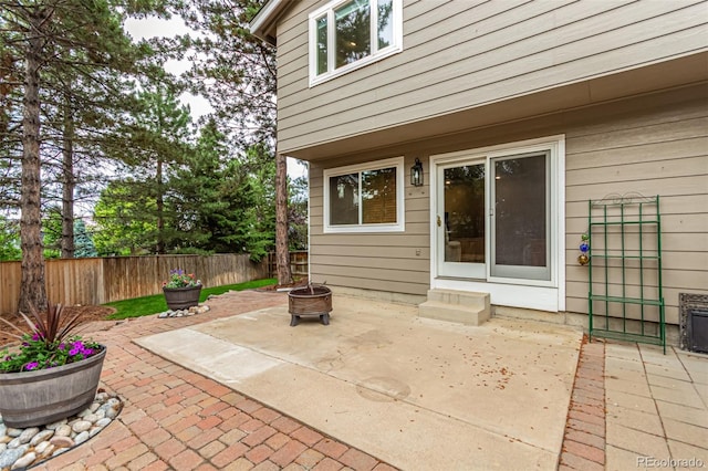 8588 S Woody Way, Highlands Ranch, CO 80126 - view of patio with an outdoor fire pit and entry steps