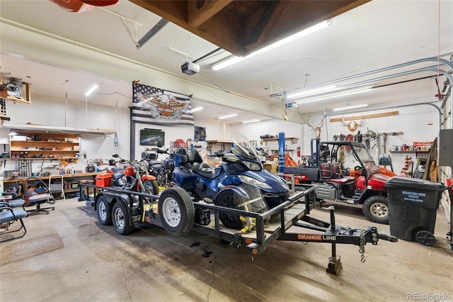 9061 N Rex Ln, Conifer, CO 80433 - garage with a workshop area and a garage door opener