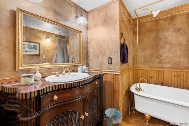 9061 N Rex Ln, Conifer, CO 80433 - bathroom with vanity, a freestanding bath, curtained shower, wainscoting, and wood walls