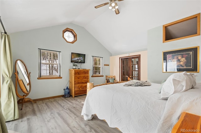 9061 N Rex Ln, Conifer, CO 80433 - bedroom with wood finished floors, a ceiling fan, baseboards, and high vaulted ceiling