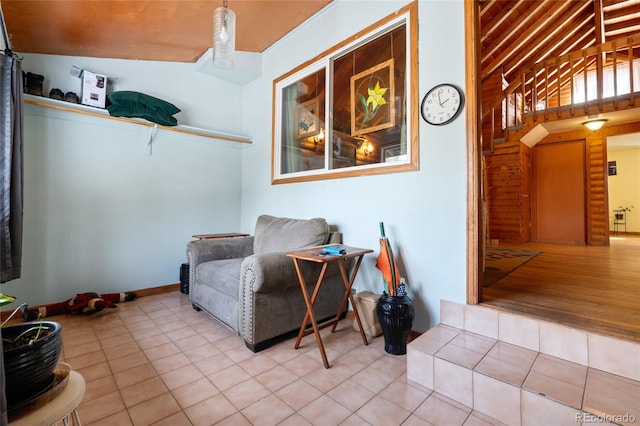 9061 N Rex Ln, Conifer, CO 80433 - living area with vaulted ceiling and tile patterned floors