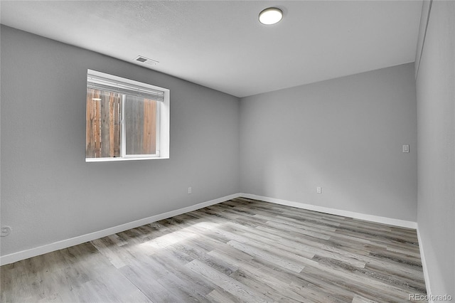 3470 W Walsh Pl, Denver, CO 80219 - empty room featuring wood finished floors and baseboards