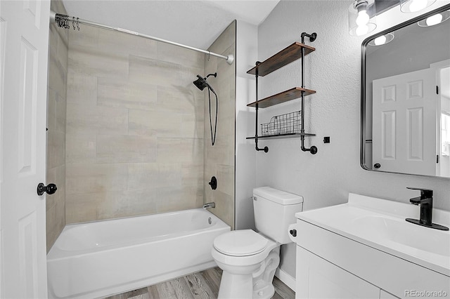 3470 W Walsh Pl, Denver, CO 80219 - bathroom featuring vanity, bathtub / shower combination, and wood finished floors