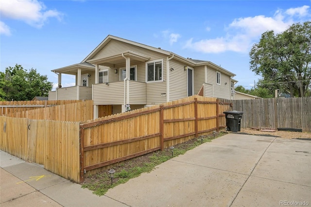 3470 W Walsh Pl, Denver, CO 80219 - view of front of home with a patio area