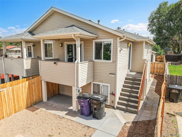 3470 W Walsh Pl, Denver, CO 80219 - view of front of house featuring a shingled roof