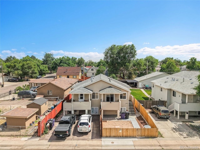3470 W Walsh Pl, Denver, CO 80219 - view of front of house featuring a fenced front yard and a residential view