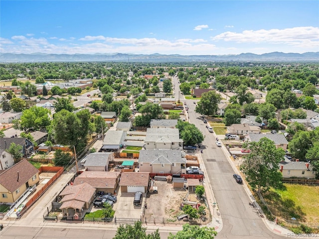 3470 W Walsh Pl, Denver, CO 80219 - aerial perspective of suburban area with a mountain backdrop