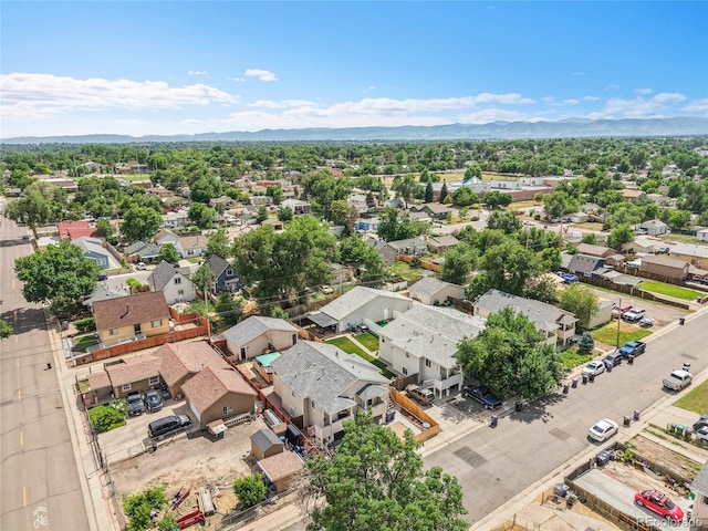3470 W Walsh Pl, Denver, CO 80219 - aerial view of residential area with a mountain backdrop