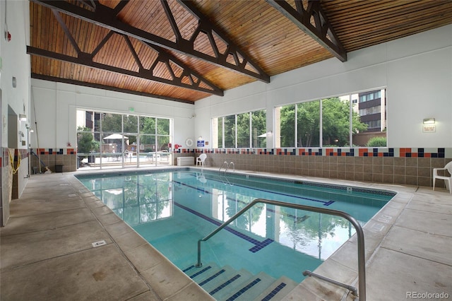 view of pool featuring ceiling fan