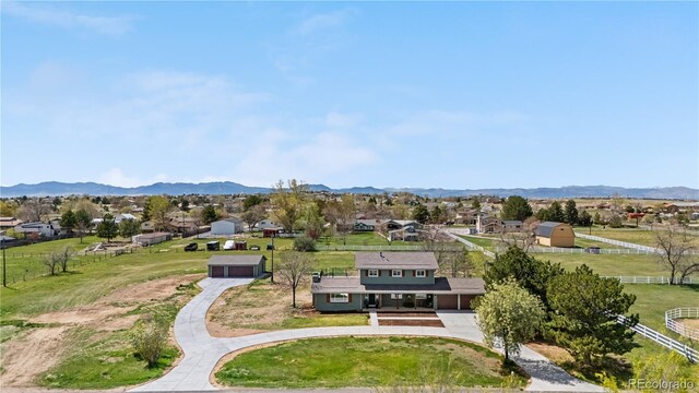 aerial perspective of suburban area with mountains