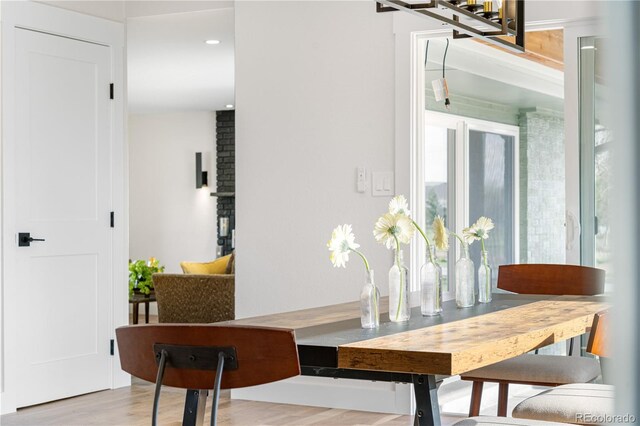 dining space featuring wood finished floors