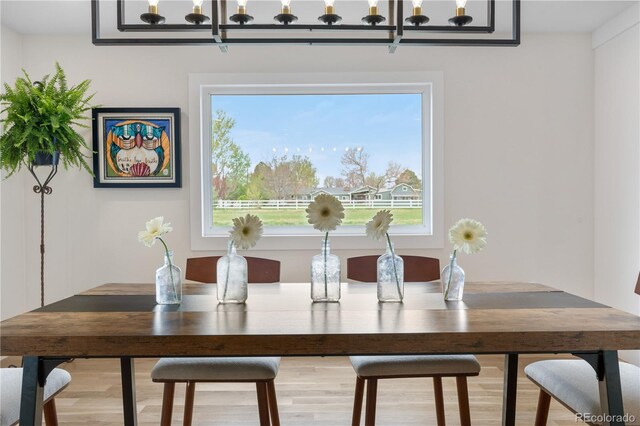 dining area featuring a chandelier