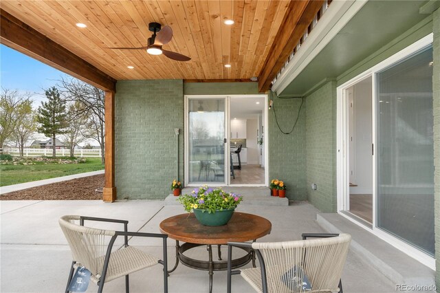 view of patio / terrace featuring a ceiling fan