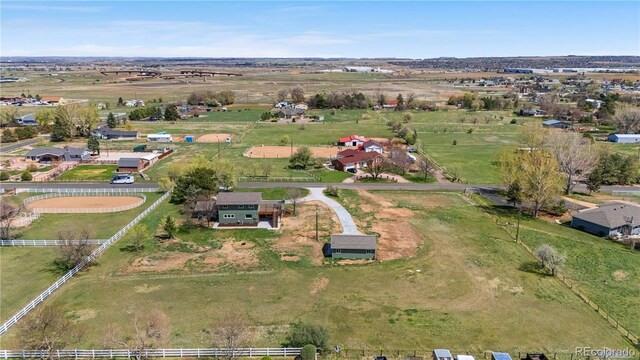 aerial view of property and surrounding area with rural landscape