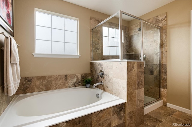 bathroom featuring independent shower and bath and tile patterned floors