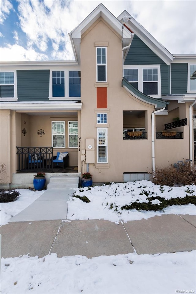 multi unit property featuring covered porch