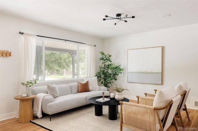 2263 Yellowstone St, Golden, CO 80401 - living area featuring light wood-style flooring and baseboards