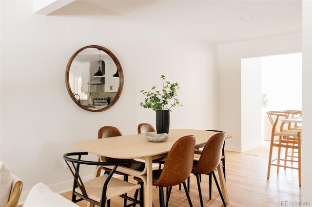 2263 Yellowstone St, Golden, CO 80401 - dining room with light wood-type flooring and baseboards