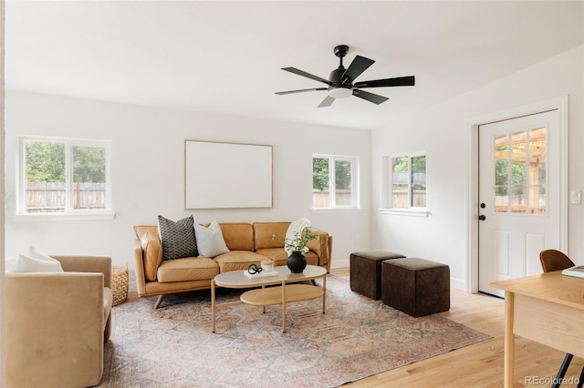 2263 Yellowstone St, Golden, CO 80401 - living area featuring plenty of natural light, wood finished floors, and ceiling fan