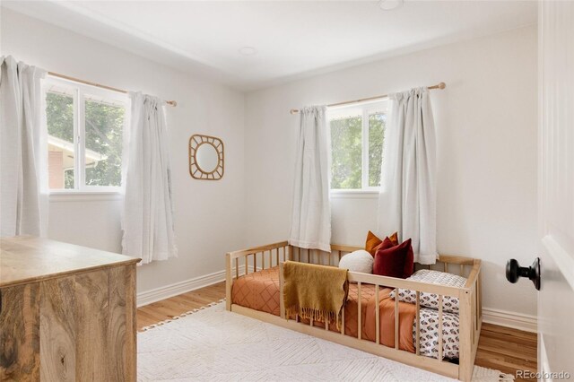 2263 Yellowstone St, Golden, CO 80401 - bedroom featuring wood finished floors and baseboards