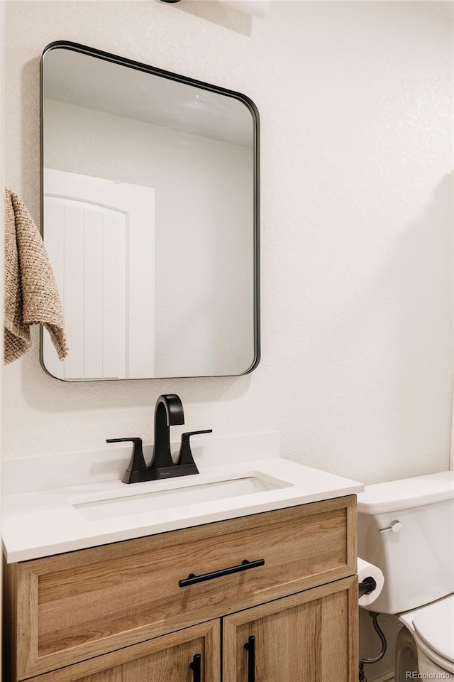 2263 Yellowstone St, Golden, CO 80401 - bathroom with vanity and toilet