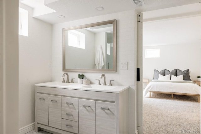 2263 Yellowstone St, Golden, CO 80401 - full bath with double vanity and plenty of natural light