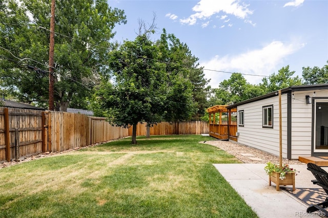 2263 Yellowstone St, Golden, CO 80401 - fenced backyard with a patio