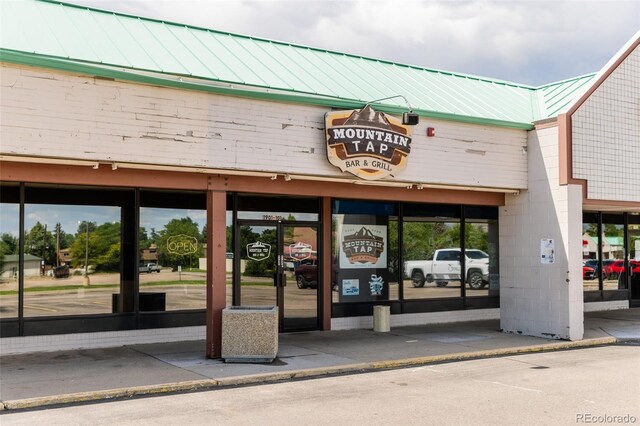 2263 Yellowstone St, Golden, CO 80401 - property entrance featuring a standing seam roof and a metal roof