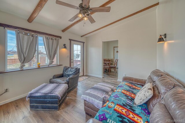 56506 County Road Aa, Moffat, CO 81143 - living room with baseboards, wood finished floors, and a ceiling fan