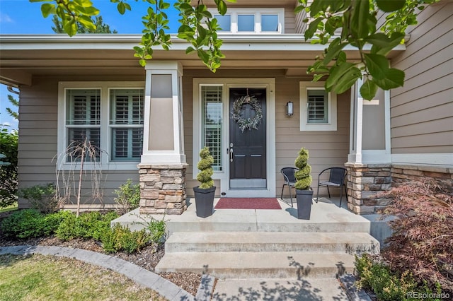 property entrance featuring a porch