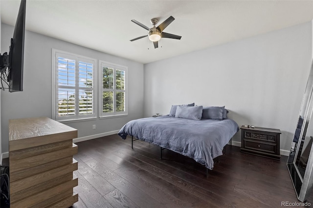 bedroom featuring ceiling fan and dark wood-type flooring