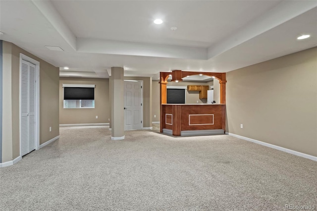 unfurnished living room with carpet floors