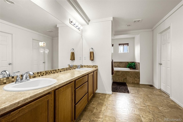 20109 Randolph Pl, Denver, CO 80249 - full bathroom featuring double vanity, a garden tub, and crown molding