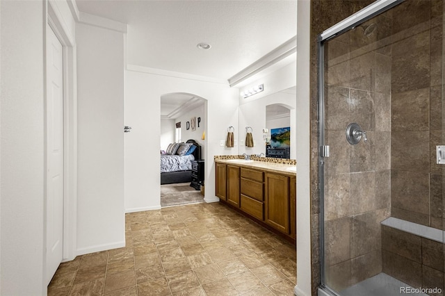 20109 Randolph Pl, Denver, CO 80249 - ensuite bathroom with a shower stall, double vanity, and crown molding