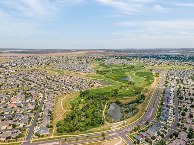 20109 Randolph Pl, Denver, CO 80249 - aerial view of property's location featuring a nearby body of water, nearby suburban area, and a local golf course