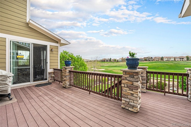 2349 Hickory Pl, Erie, CO 80516 - wooden terrace featuring a lawn and view of golf course