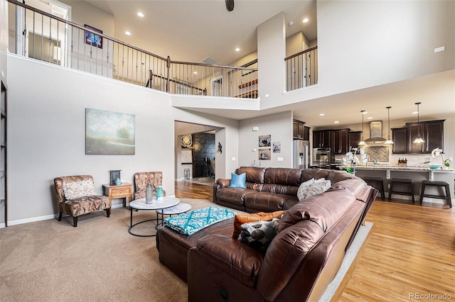 2349 Hickory Pl, Erie, CO 80516 - living area featuring recessed lighting, baseboards, and a towering ceiling