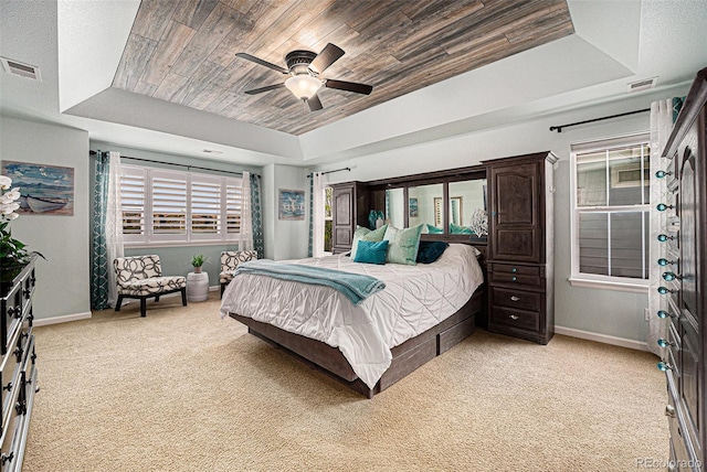 2349 Hickory Pl, Erie, CO 80516 - bedroom with light colored carpet, baseboards, visible vents, and a raised ceiling