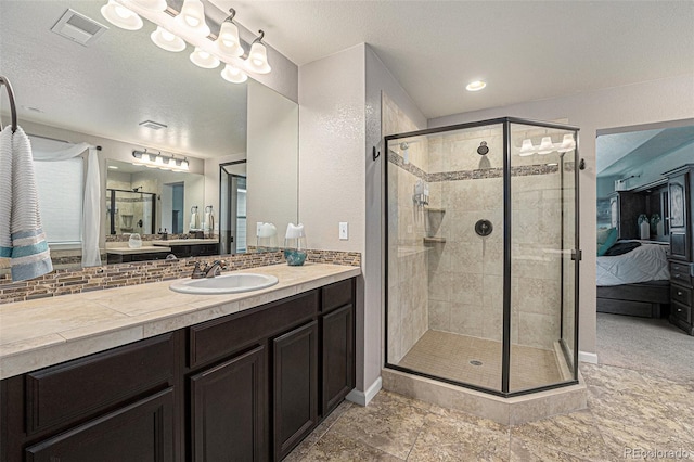 2349 Hickory Pl, Erie, CO 80516 - ensuite bathroom with visible vents, ensuite bathroom, tasteful backsplash, and a shower stall
