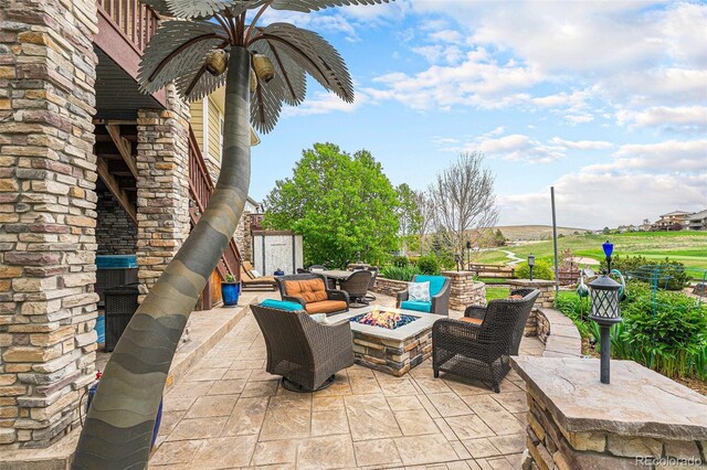 2349 Hickory Pl, Erie, CO 80516 - view of patio with a fire pit
