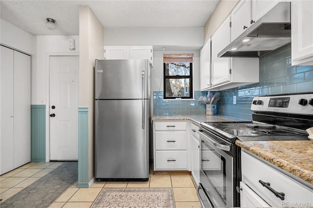 8773 W Cornell Ave Unit 10, Lakewood, CO 80227 - kitchen featuring appliances with stainless steel finishes, under cabinet range hood, white cabinets, decorative backsplash, and a textured ceiling