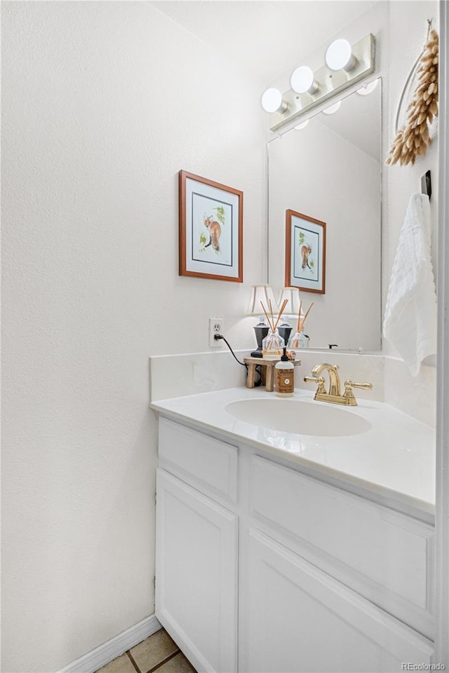 8773 W Cornell Ave Unit 10, Lakewood, CO 80227 - bathroom featuring vanity and tile patterned flooring