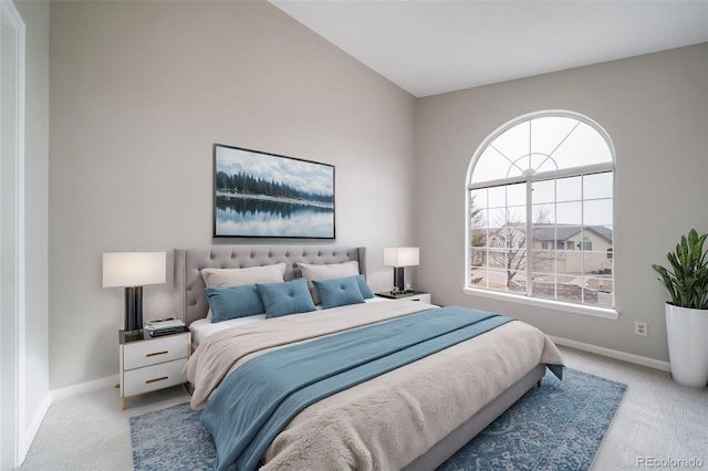 carpeted bedroom with baseboards