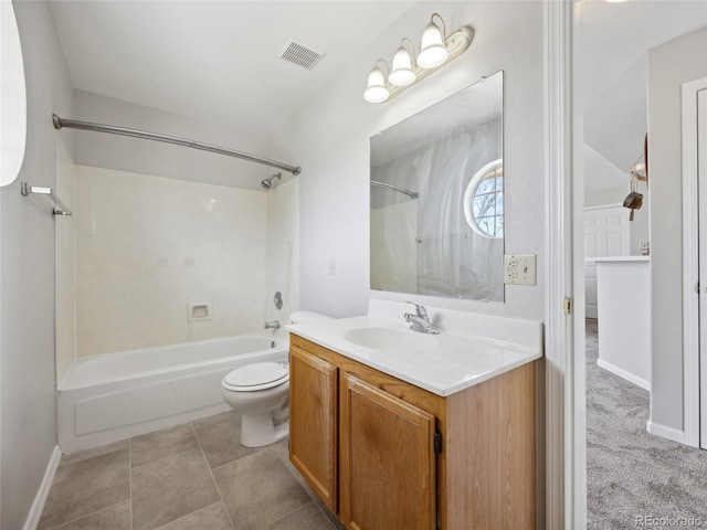 bathroom with bathing tub / shower combination, toilet, and vanity