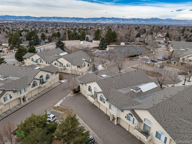 aerial perspective of suburban area with a mountain backdrop