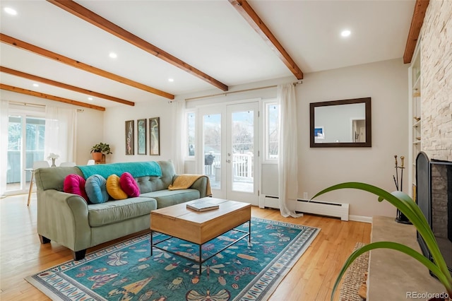 11845 W 30th Pl, Lakewood, CO 80215 - living room featuring a baseboard heating unit, beam ceiling, light wood-type flooring, french doors, and recessed lighting