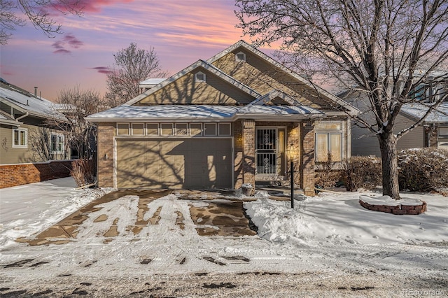 view of front of property with a garage