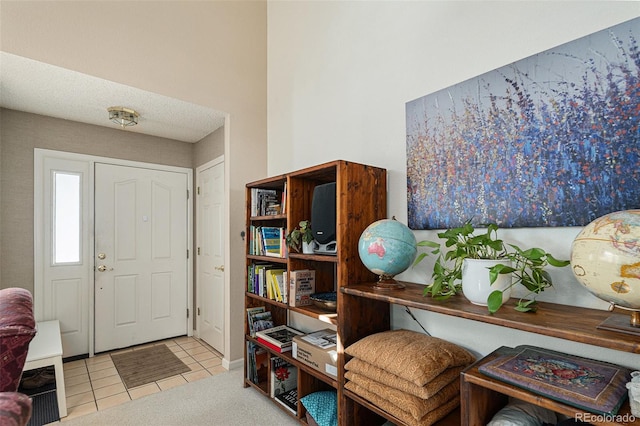 view of tiled foyer entrance