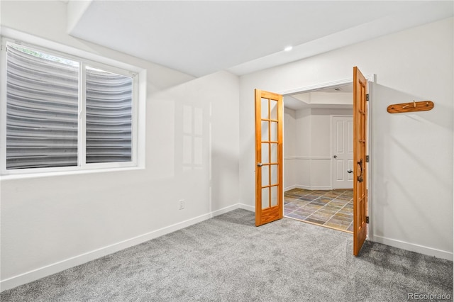 1511 Peninsula Cir, Castle Rock, CO 80104 - unfurnished room featuring carpet and french doors